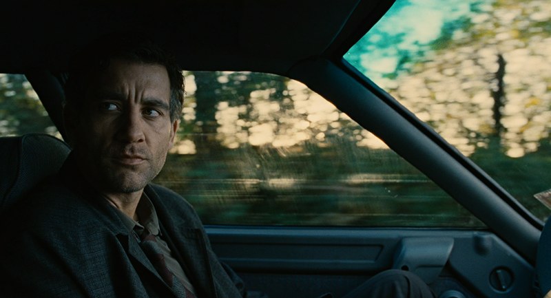 Children of Men fotografía de Emmanuel Lubezki con Clive Owen en el interior de un coche durante la secuencia del ataque