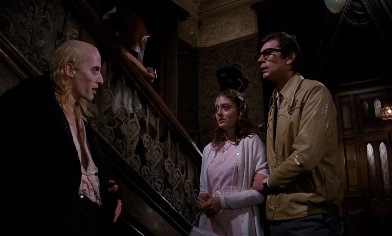 Richard O’Brien, Susan Sarandon and Barry Bostwick inside the castle in The Rocky Horror Picture Show